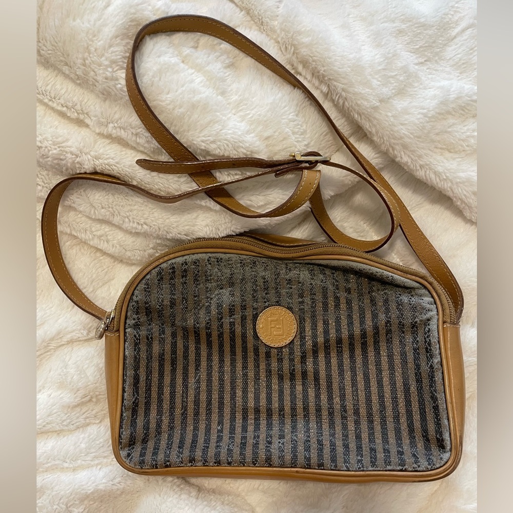 Vintage Fendi bag with brown and tan stripes.